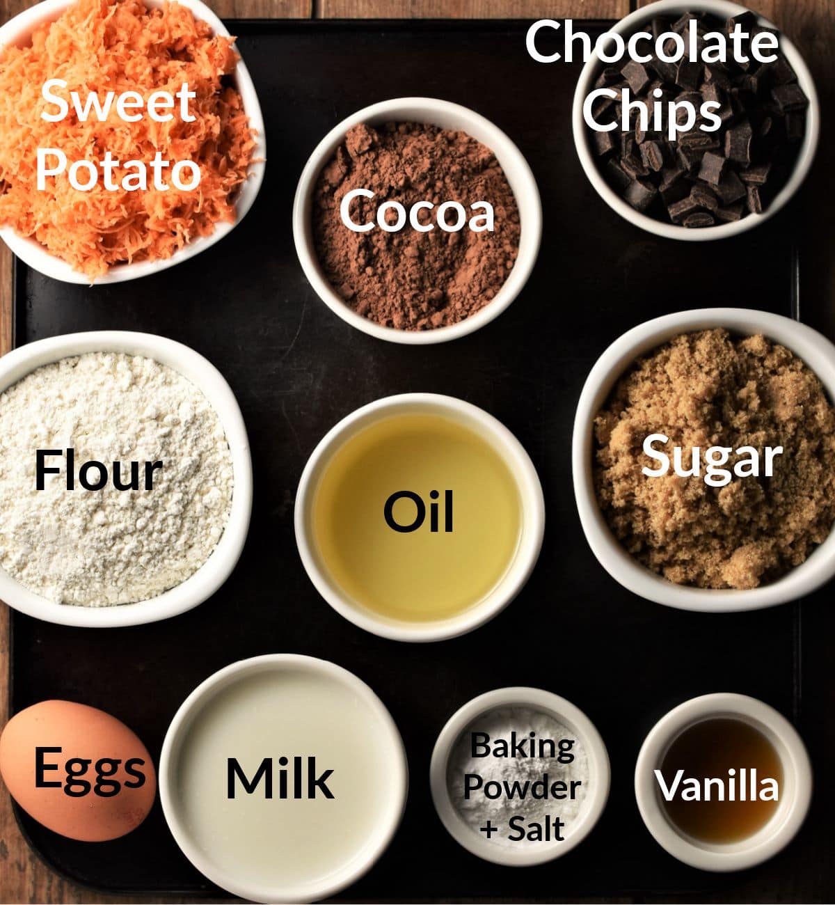 Sweet potato chocolate muffins ingredients in individual dishes.