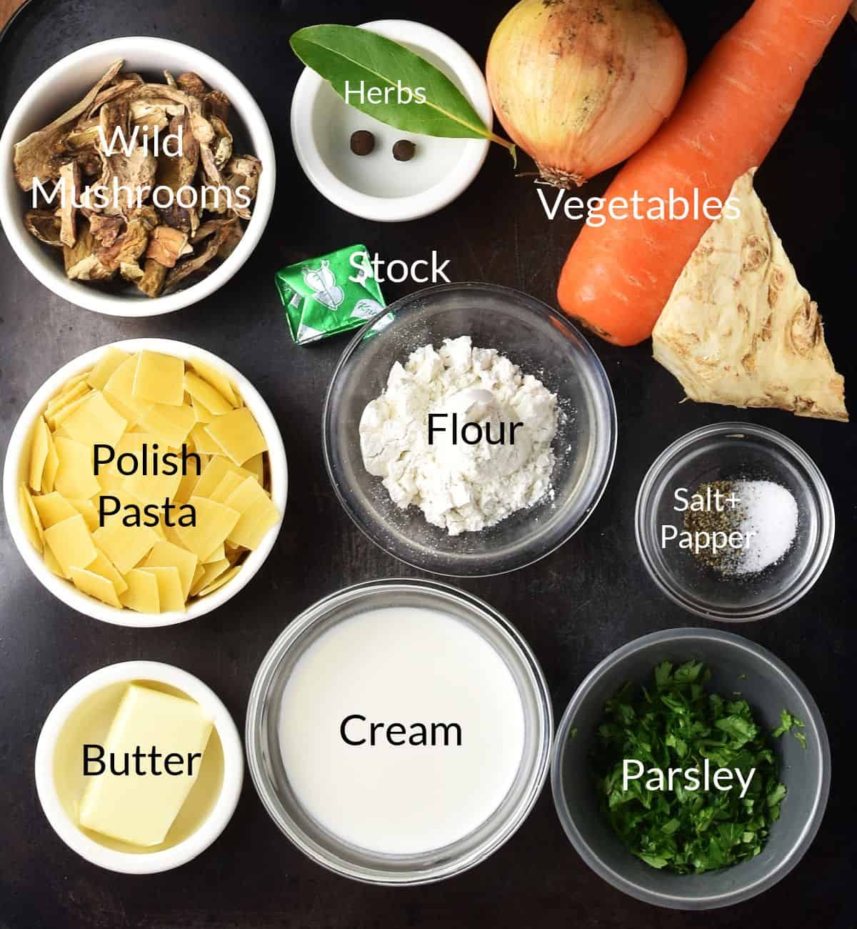 Top down view of polish Christmas mushroom soup ingredients in individual dishes.