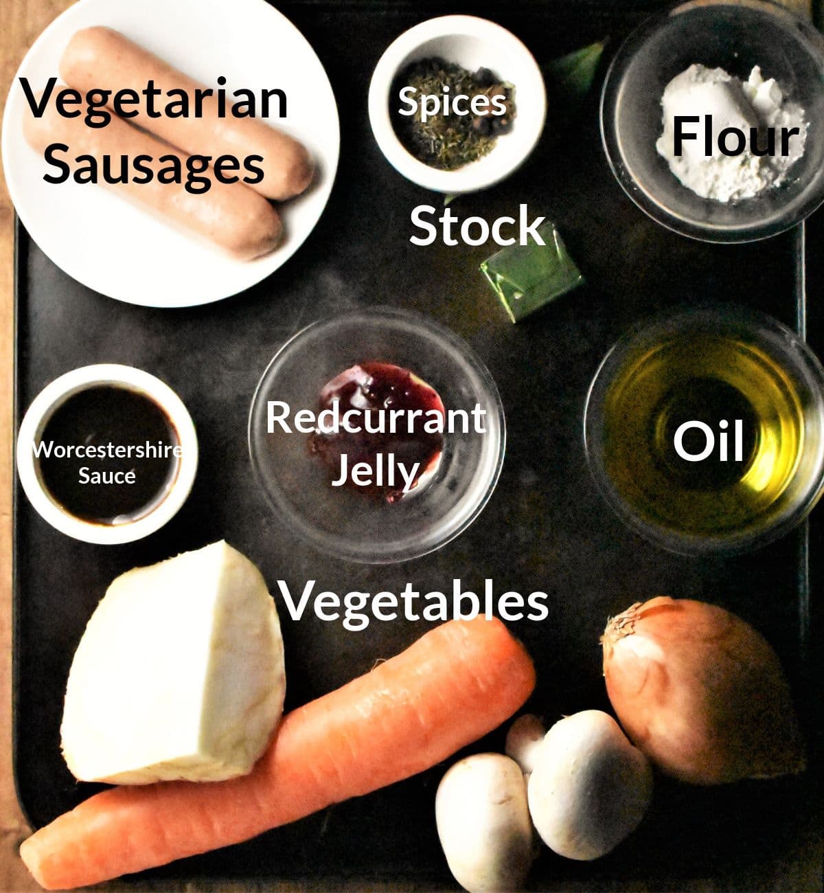 Ingredients for making vegetarian sausage pie in individual dishes.