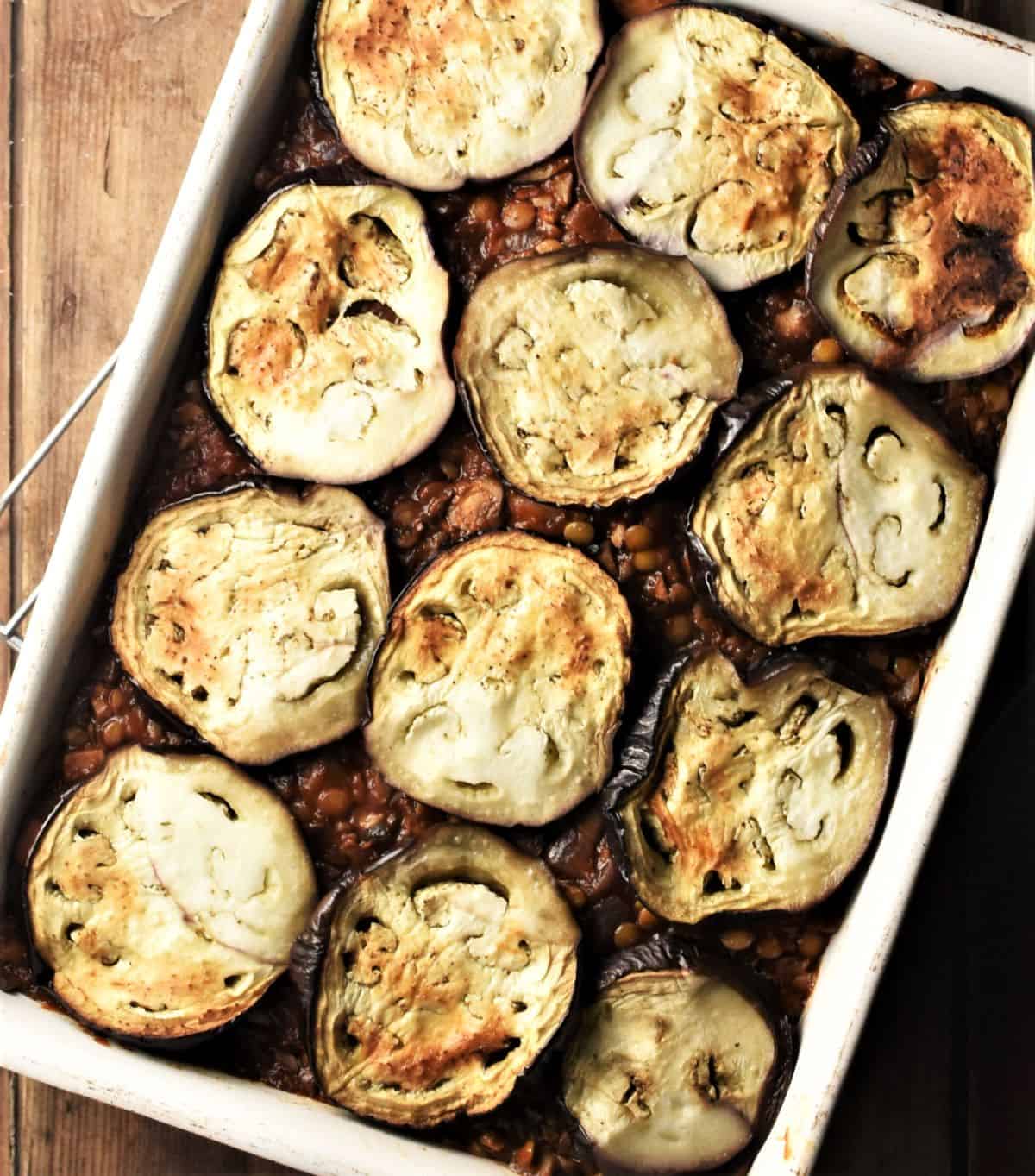 Layer of eggplant over mushroom filling for moussaka.