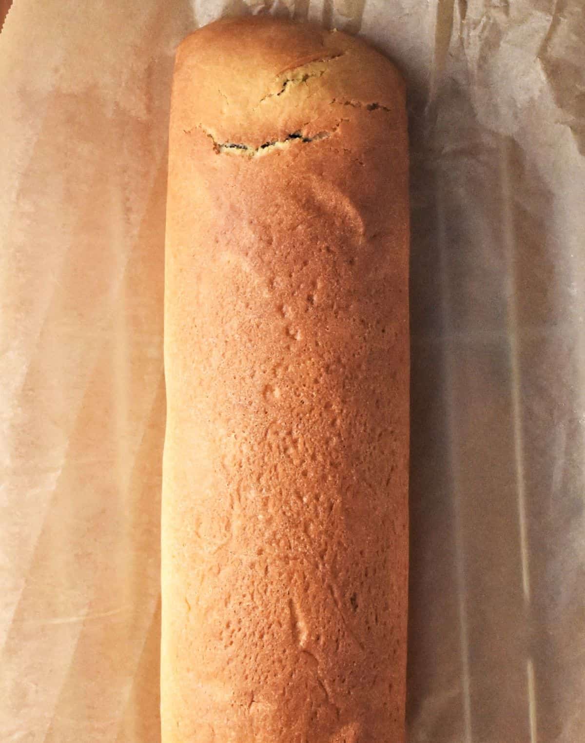 Polish makowiec cake on top of parchment.