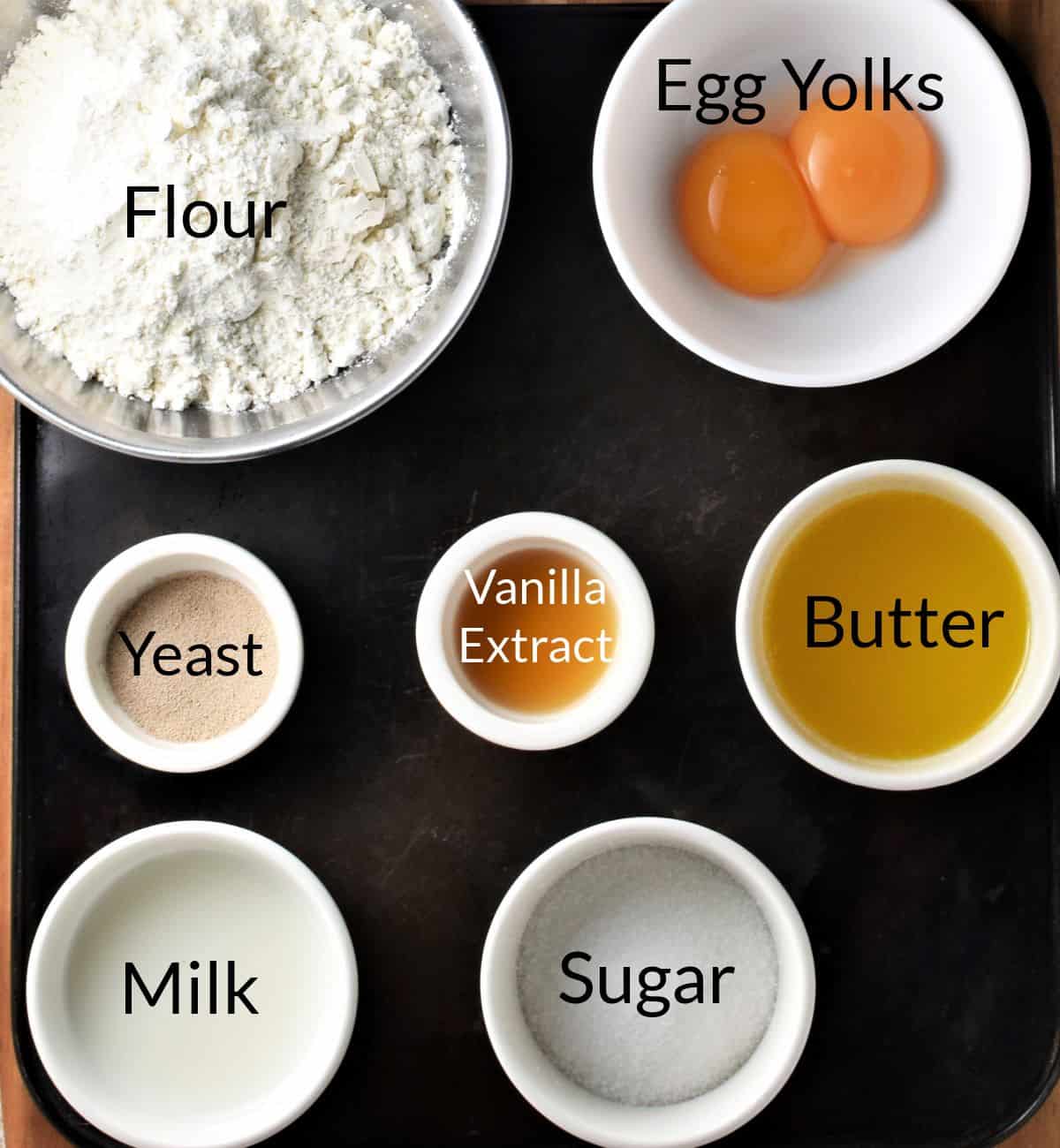 Ingredients for making poppy seed cake dough recipe in individual dishes.