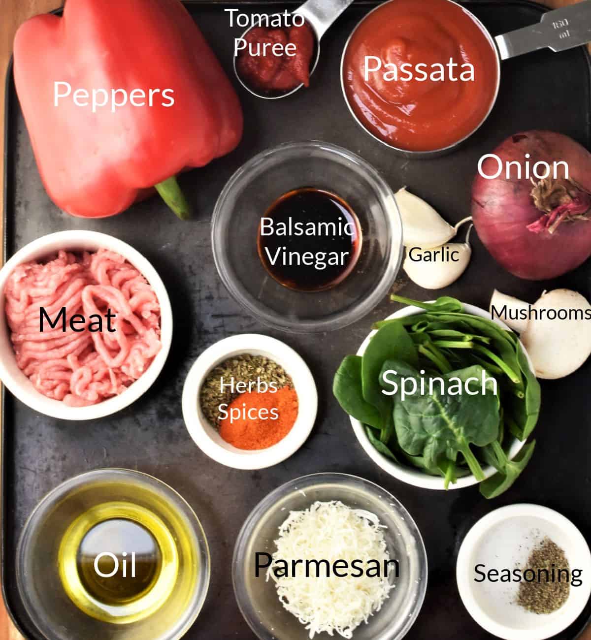 Ingredients for making rice free stuffed peppers in individual dishes.