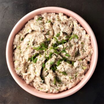 Top down view of smoked mackerel pate in pink bowl.