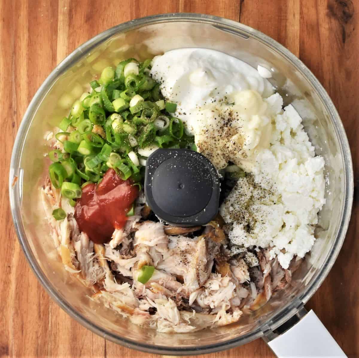 Ingredients for making pate with smoked mackerel in blender bowl.