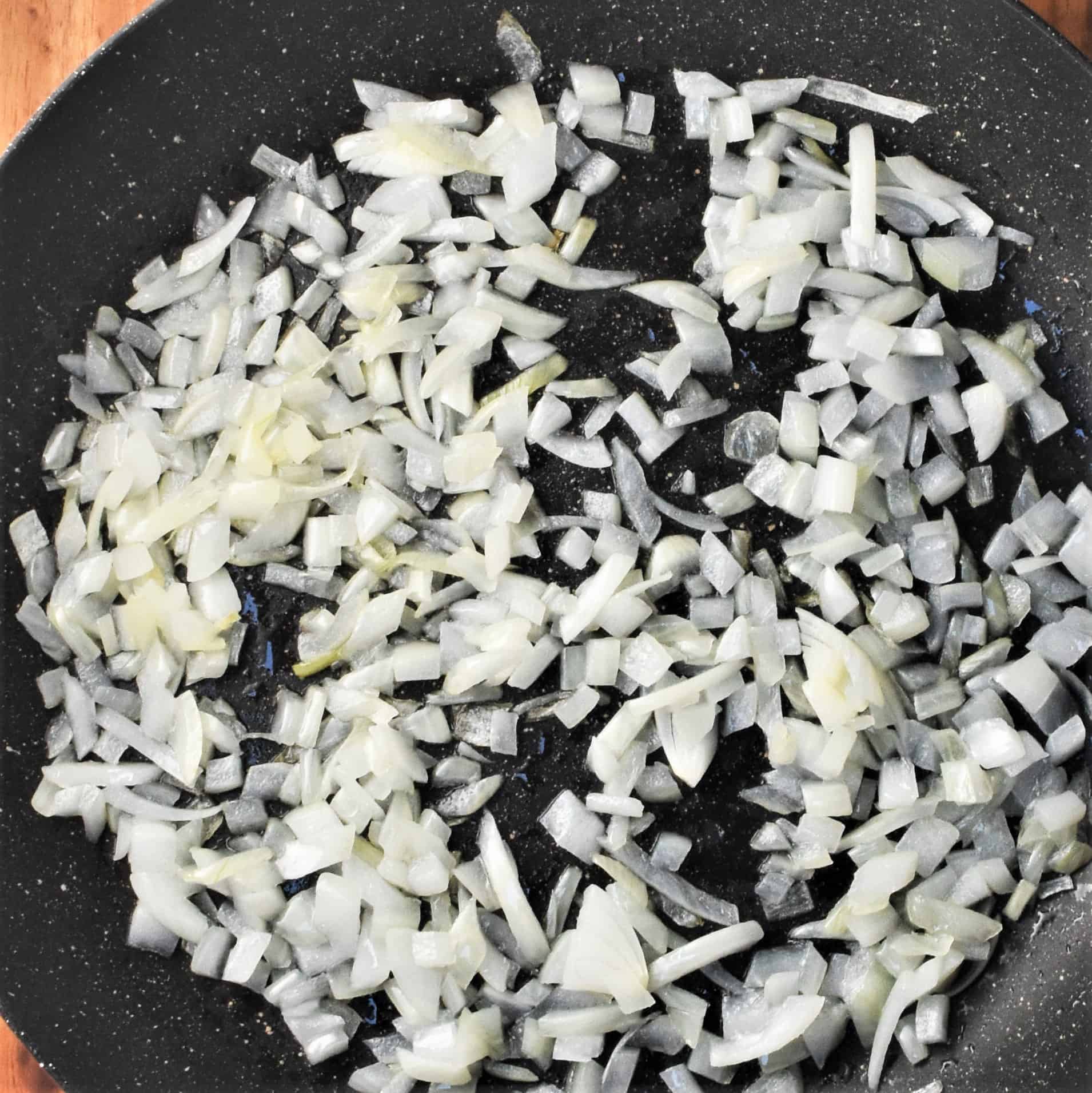 Chopped onion in large pan.