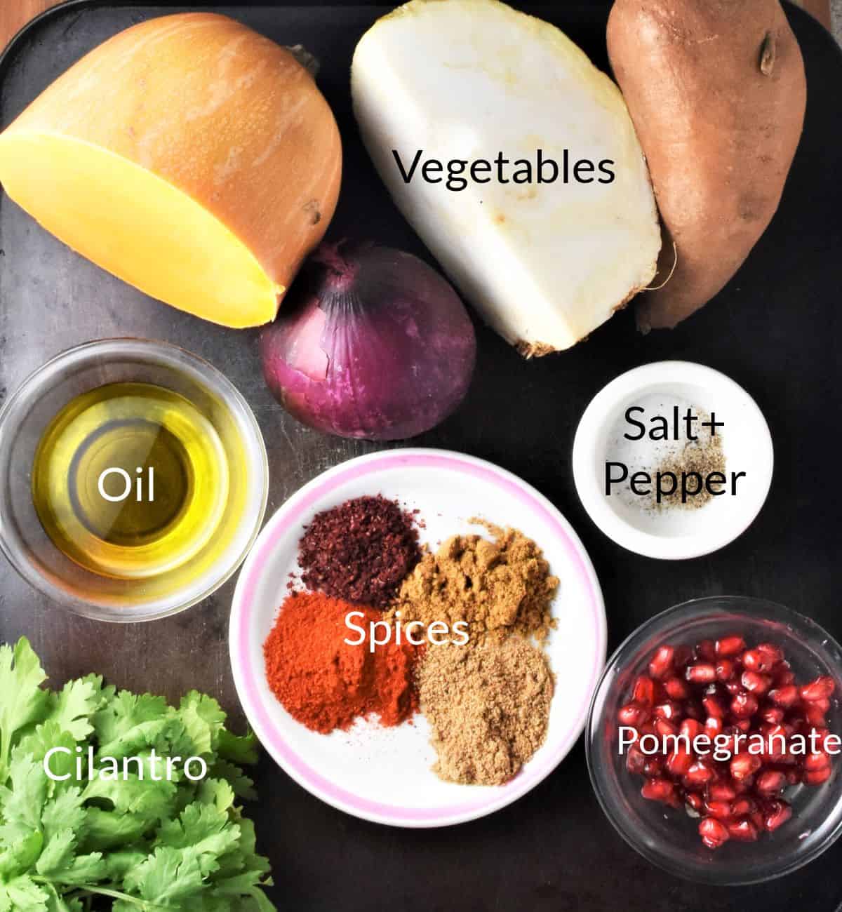 Ingredients for making roasted veggie salad in individual dishes.