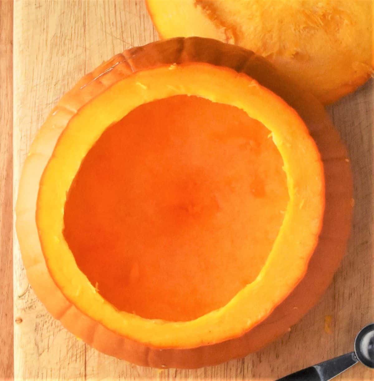 Top down view of hollowed-out pumpkin.
