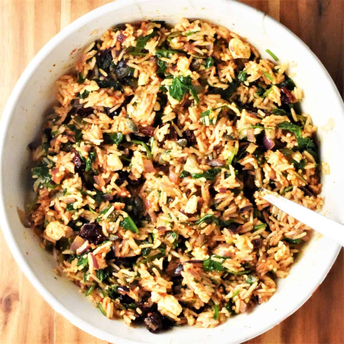 Filling mixture for stuffing pumpkin in white bowl.