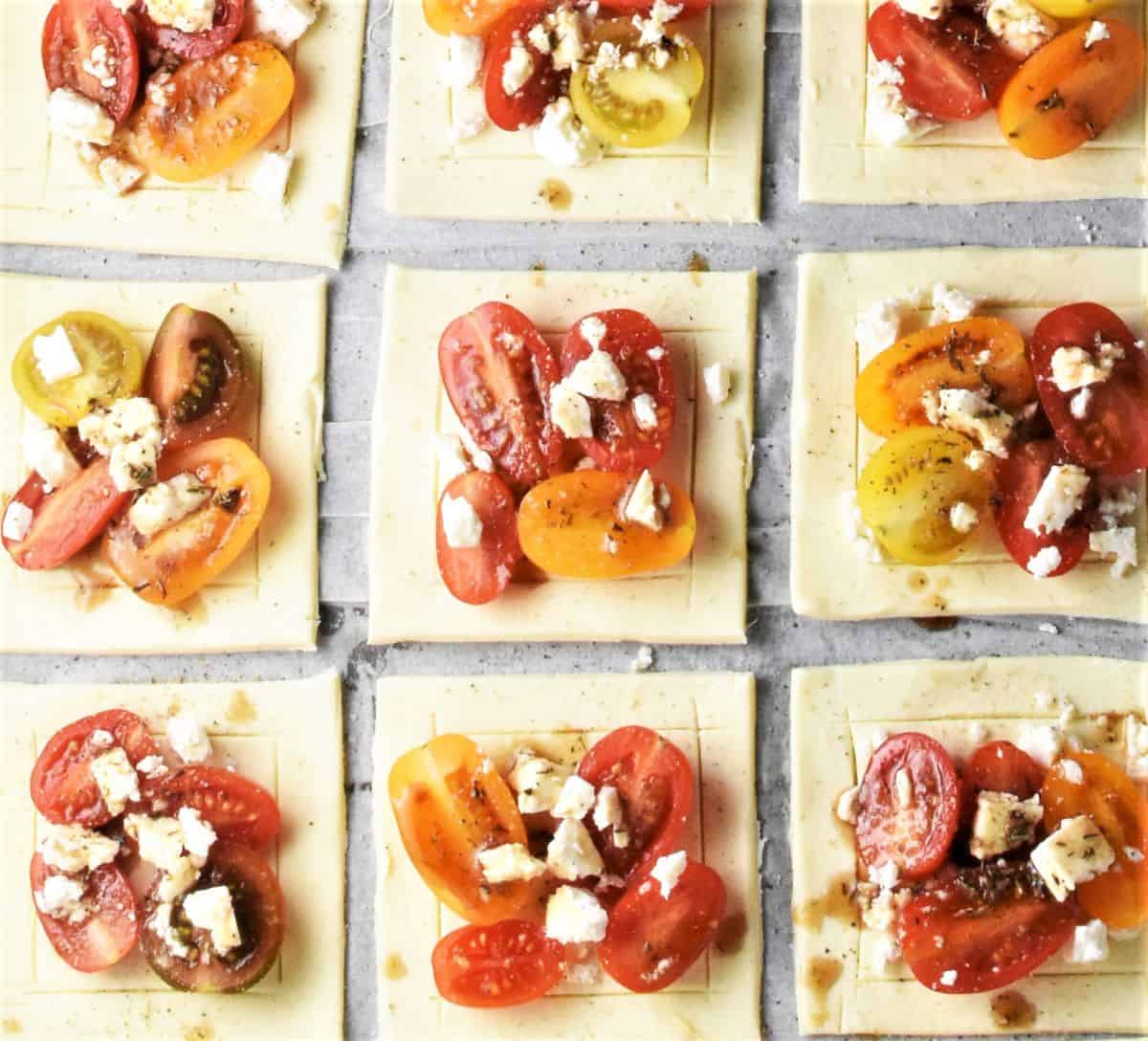Making tomato tartlets with puff pastry.