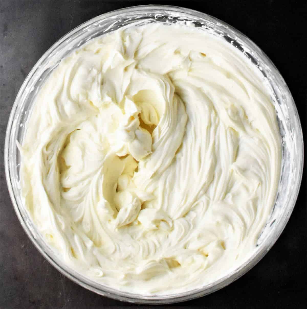 Fluffy cheese mixture in large bowl.