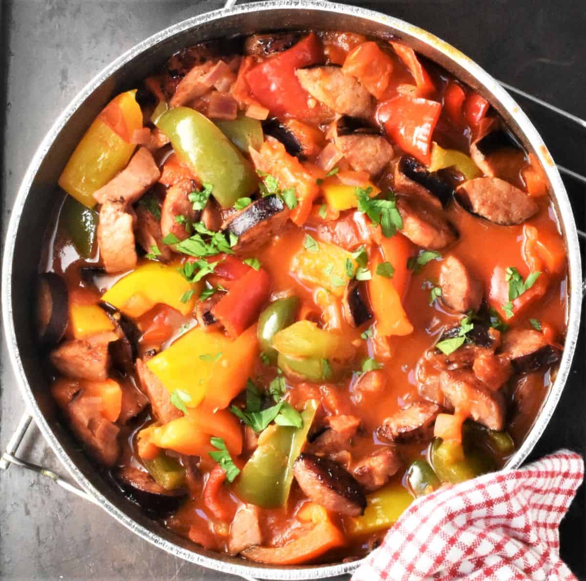 Top down view of Polish leczo stew in large pot.
