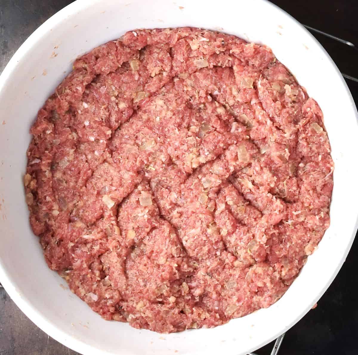 Turkey meatball mixture in large white bowl.