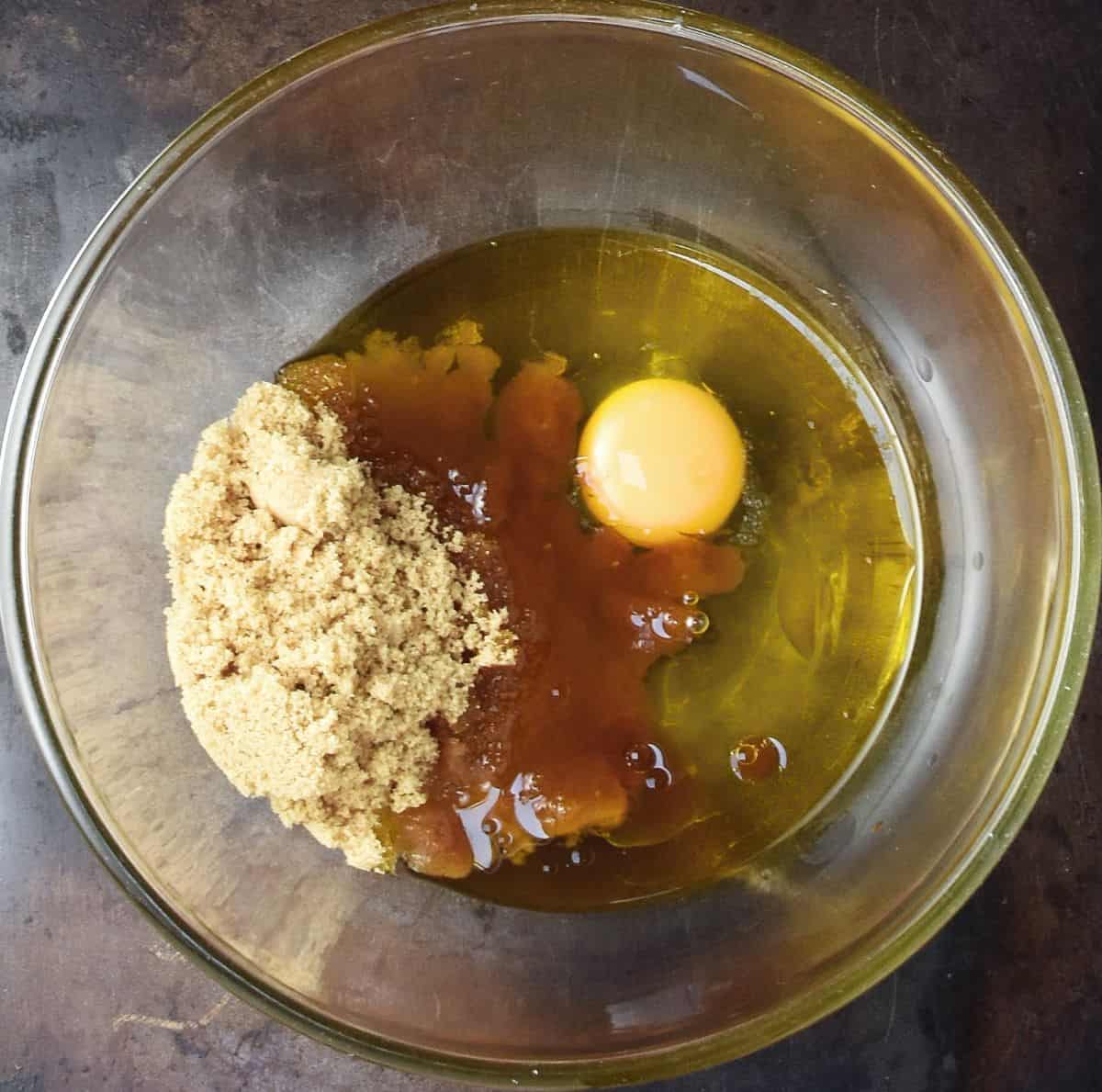 Wet mixture for muffins in large glass bowl.