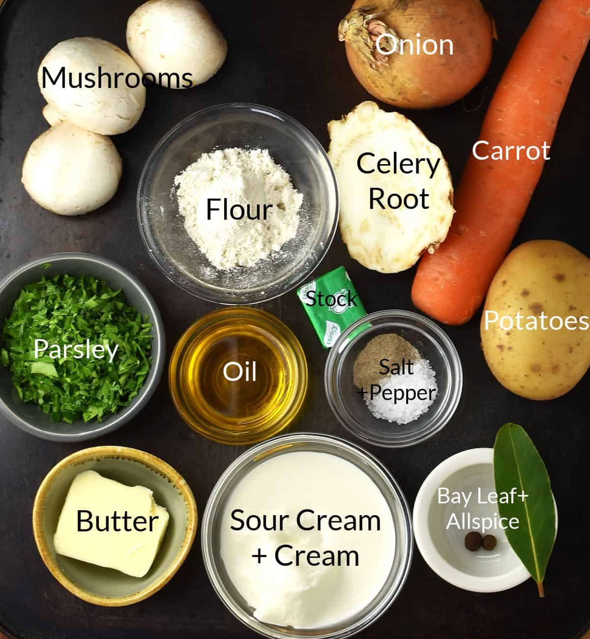 Top down view of Polish mushroom soup ingredients in individual dishes.